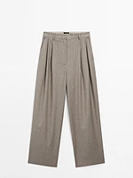 Pleated pinstripe trousers