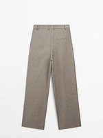 Pleated pinstripe trousers