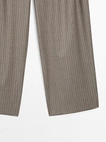 Pleated pinstripe trousers