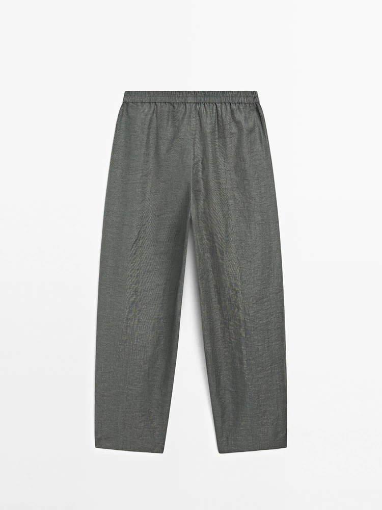 Suit trousers with elasticated waistband