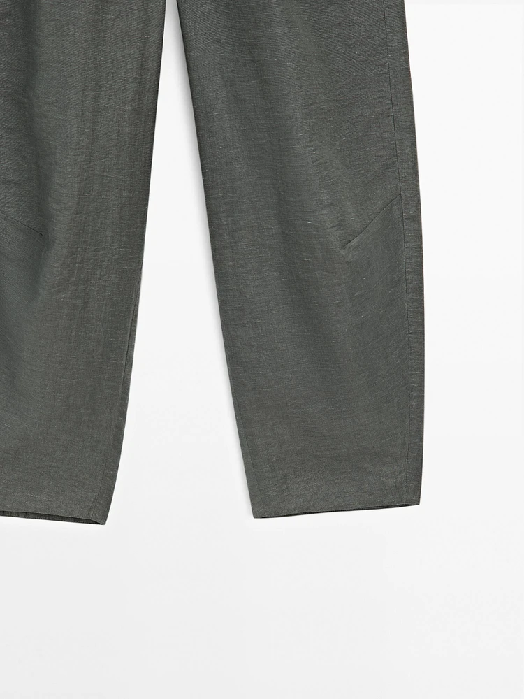 Suit trousers with elasticated waistband