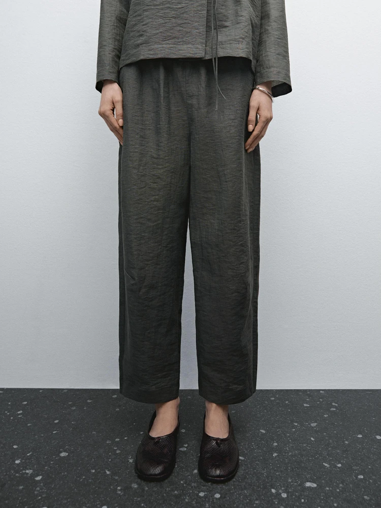 Suit trousers with elasticated waistband