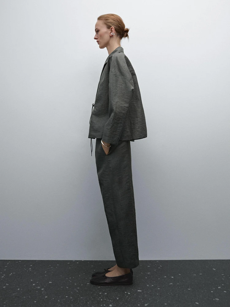 Suit trousers with elasticated waistband