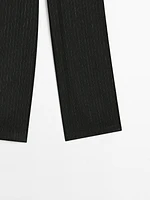 Pinstriped suit trousers