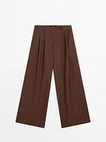 Flowing trousers with double darts