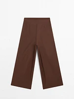 Flowing trousers with double darts