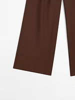 Flowing trousers with double darts