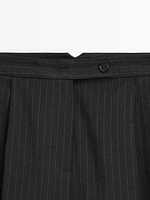 Pleated pinstripe trousers