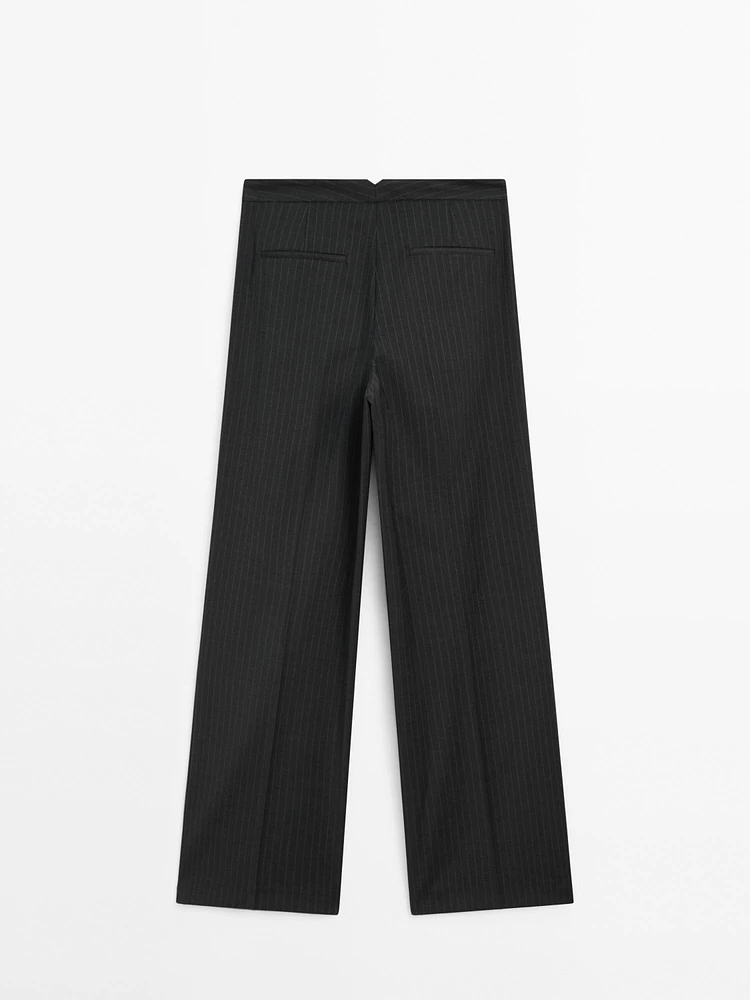 Pantalon à plis et rayures tennis