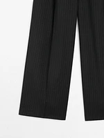 Pleated pinstripe trousers