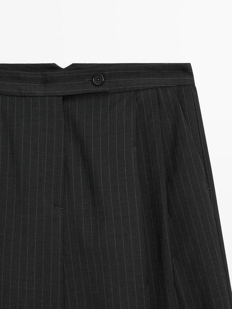 Pantalon à plis et rayures tennis