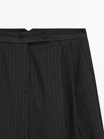 Pleated pinstripe trousers