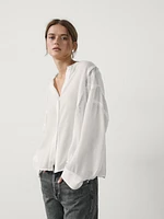 Flowing shirt with lace details