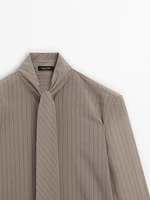 Striped shirt with tie detail