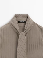 Striped shirt with tie detail