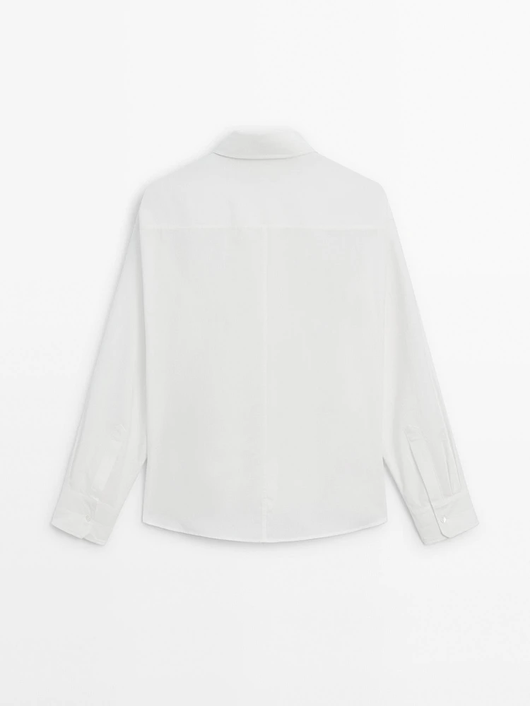 Poplin shirt with asymmetric hem