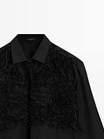 Shirt with embroidered detail on the chest