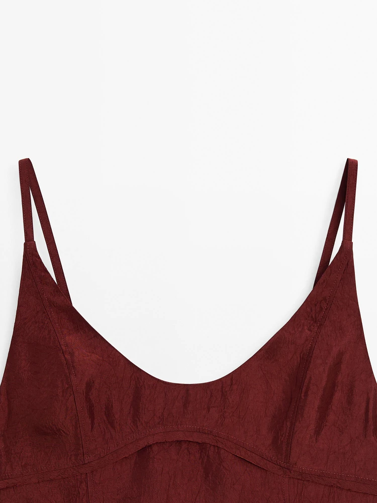 Strappy top with seam details