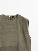 Frayed top with fabric detail