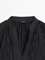 Flowing pleated shirt