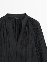 Flowing pleated shirt