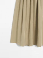 Cotton blend box pleat midi skirt