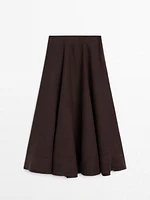 Flared linen skirt with hem detail