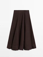 Flared linen skirt with hem detail