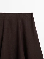 Flared linen skirt with hem detail