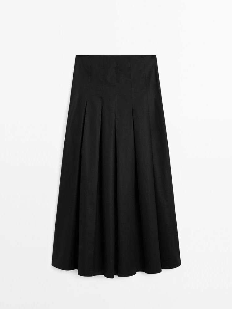 Midi skirt with asymmetric pleats