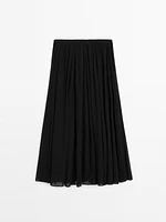 Voluminous pleated midi skirt