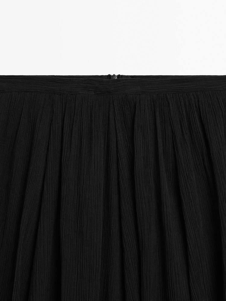 Voluminous pleated midi skirt