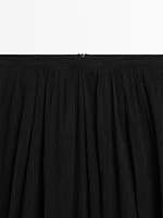 Voluminous pleated midi skirt