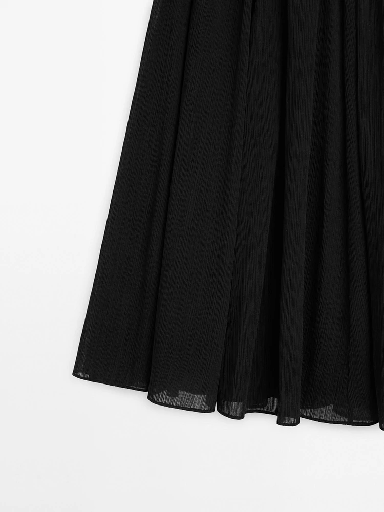 Voluminous pleated midi skirt