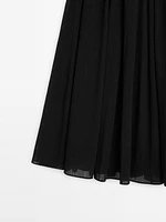 Voluminous pleated midi skirt