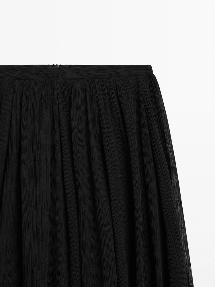 Voluminous pleated midi skirt