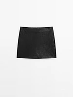 Textured nappa leather mini skirt