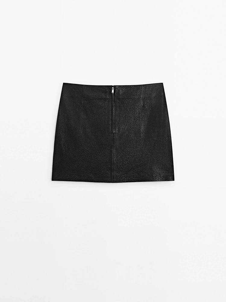 Textured nappa leather mini skirt