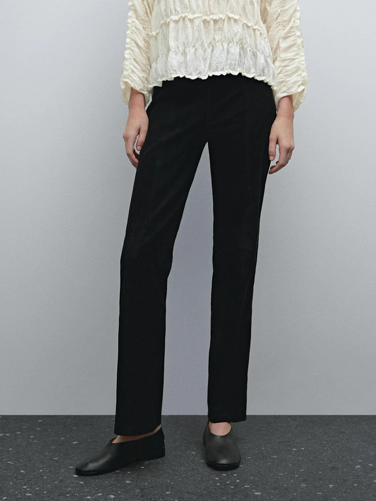 Pantalon flare stretch en cuir et daim