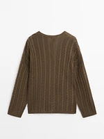 Cable-knit V-neck sweater