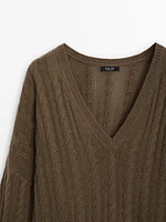 Cable-knit V-neck sweater