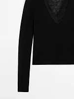 Wool knit sweater with lace trim detail