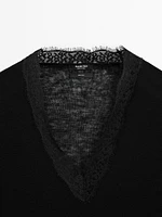 Wool knit sweater with lace trim detail