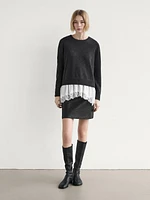 Knit sweater with lace trim on the hem