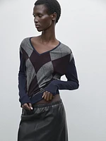 Argyle knit sweater a wool and silk blend