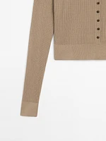 Ribbed knit sweater with polo collar and buttons