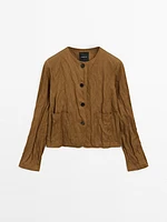 Short jacket with fabric detail