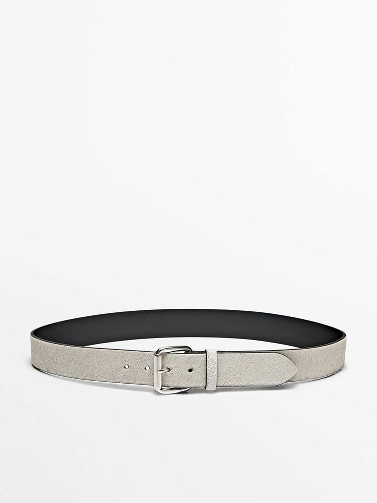 Hair on leather belt