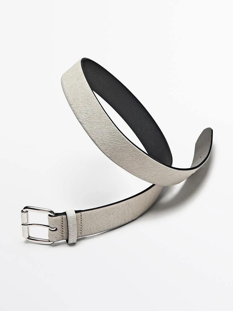 Hair on leather belt