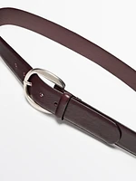 Leather belt with oval buckle